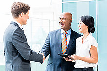 CEO and executive business handshake
